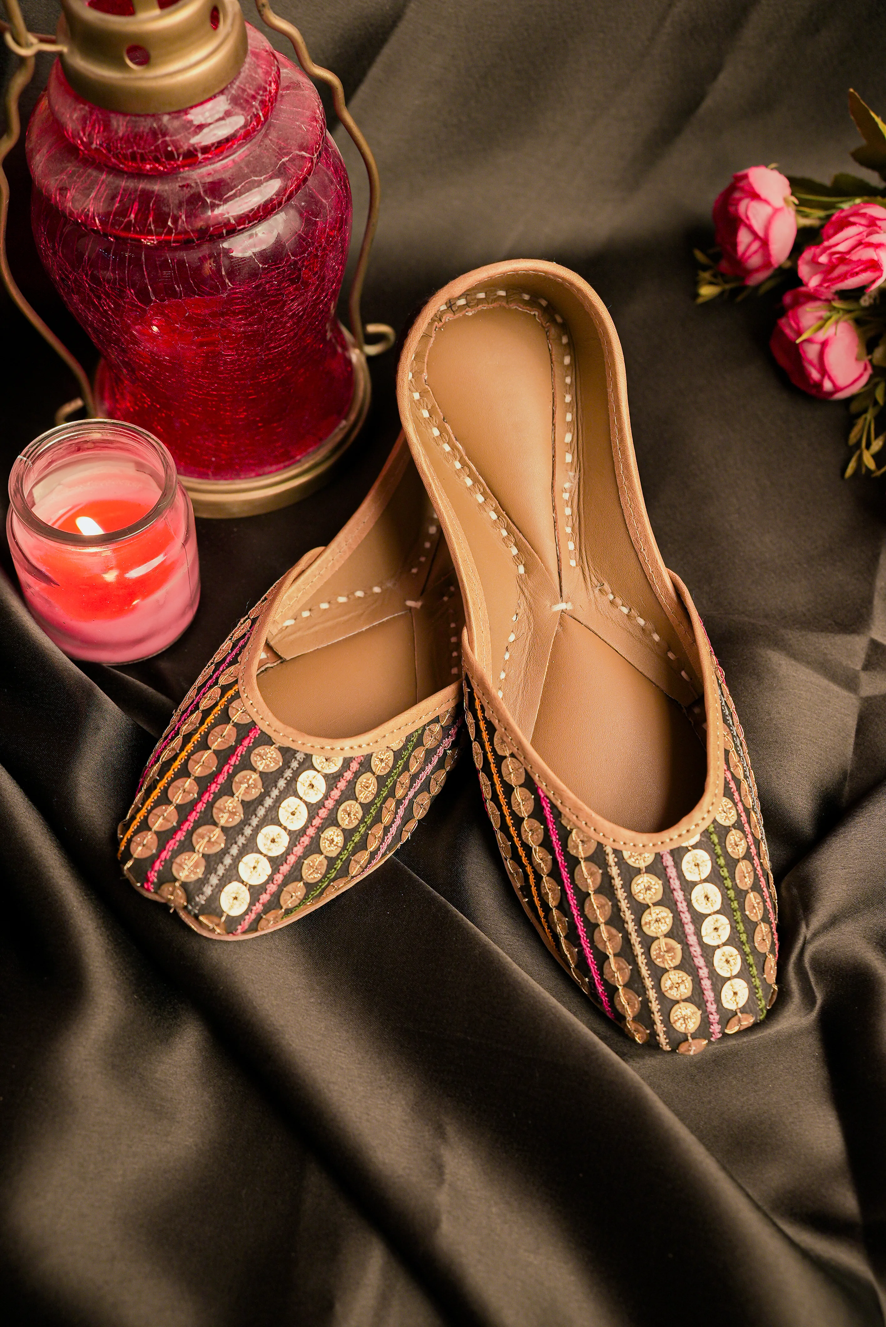 Black Embellished Punjabi Juttis with Gold and Pink Detailing